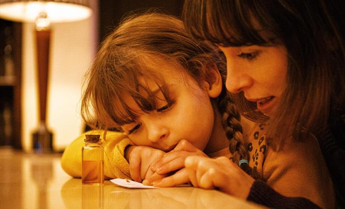 A family team working together to crack a code